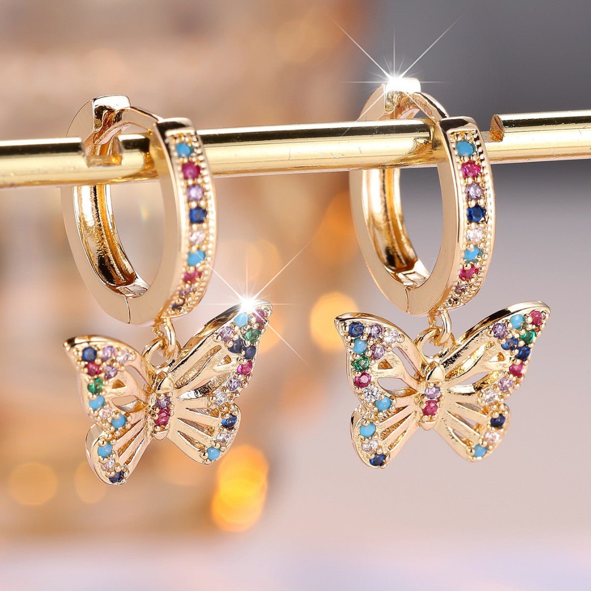 Bunte Schmetterlings - Ohrringe mit Glitzersteinen - Nach - Dir.de
